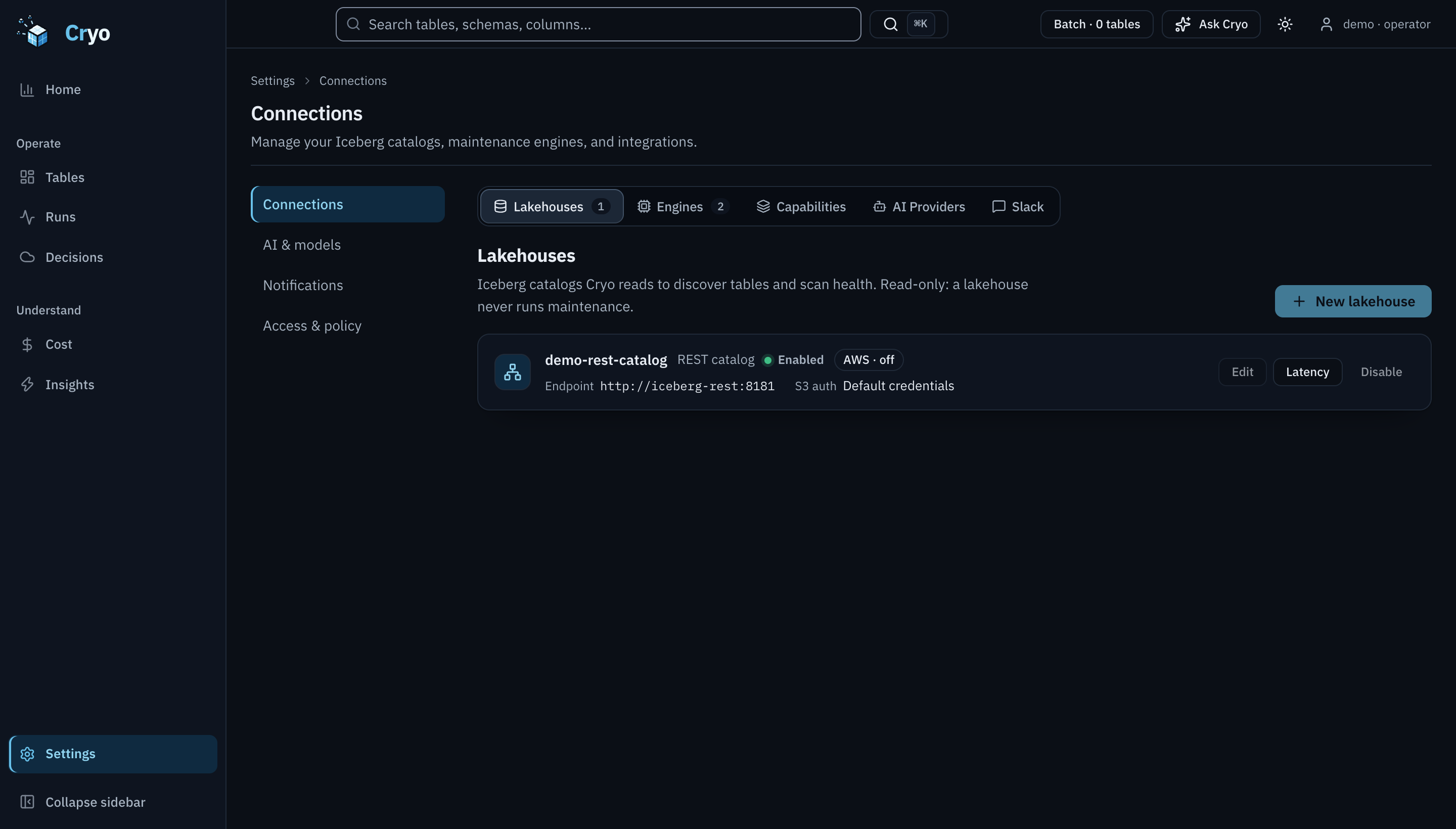 Settings, Connections, Lakehouses tab. One REST catalog named demo-rest-catalog, enabled, endpoint http://iceberg-rest:8181, S3 auth default credentials, AWS integration off. Tabs show counts: Lakehouses 1, Engines 2, then Capabilities, AI Providers and Slack.