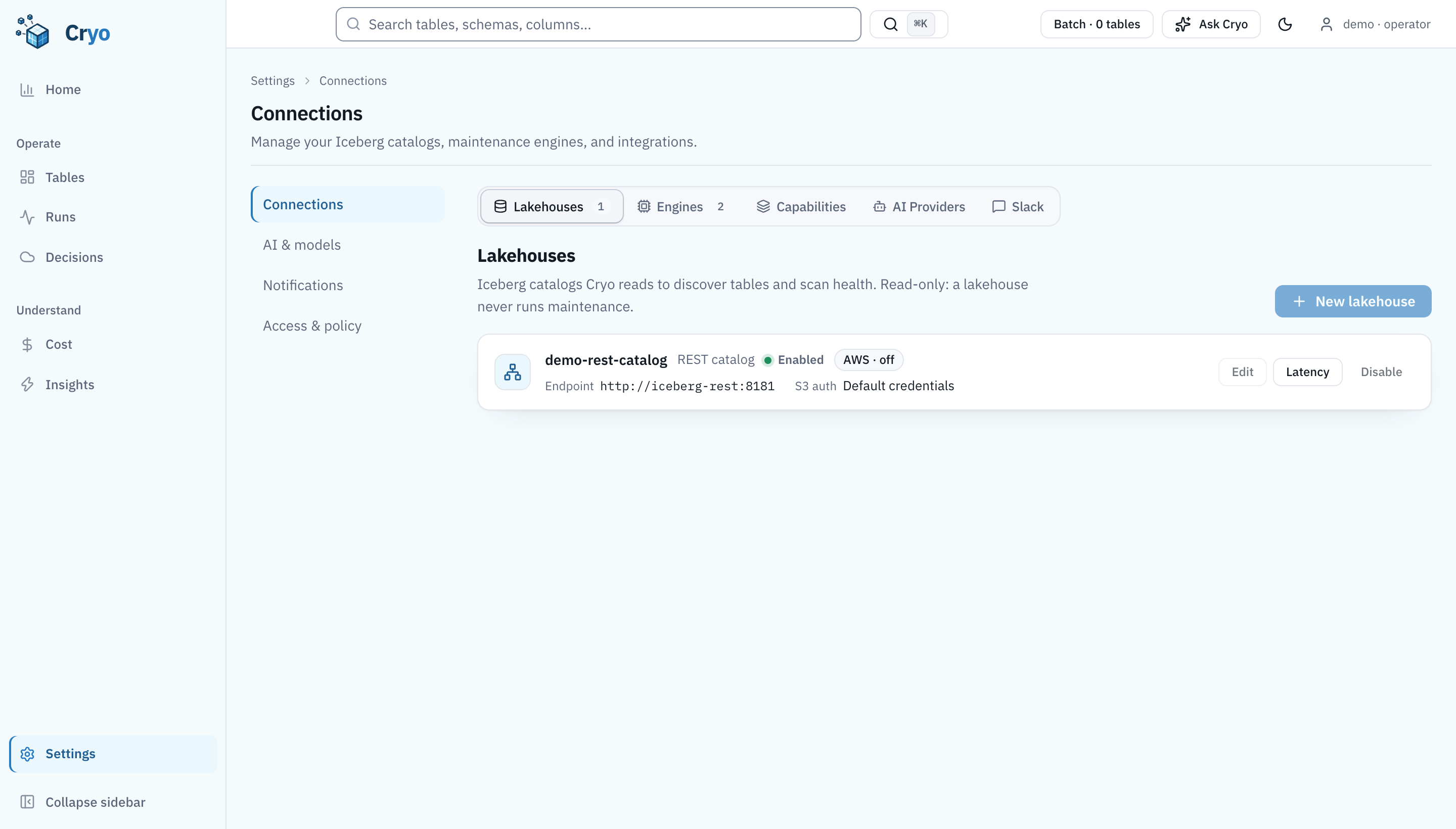Settings, Connections, Lakehouses tab. One REST catalog named demo-rest-catalog, enabled, endpoint http://iceberg-rest:8181, S3 auth default credentials, AWS integration off. Tabs show counts: Lakehouses 1, Engines 2, then Capabilities, AI Providers and Slack.